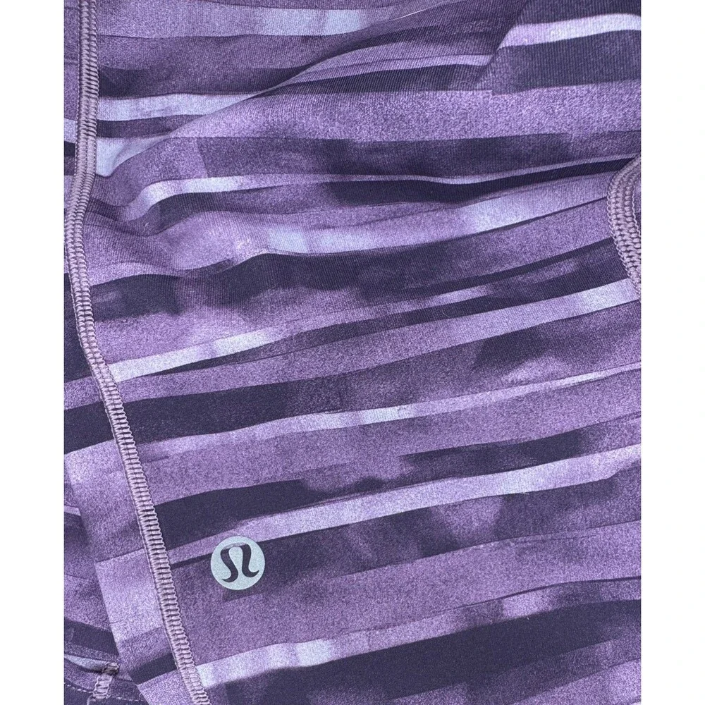 lululemon cropped purple leggings size 8 speed it up zip waist pocket
